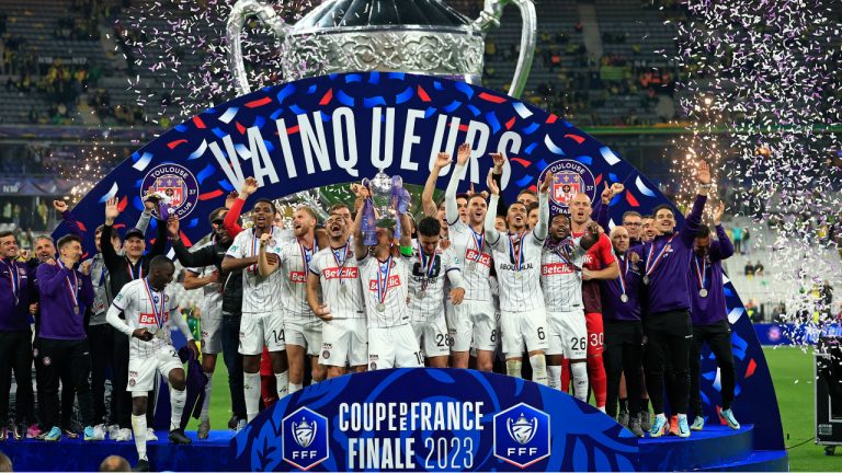 Toulouse players celebrate with the trophy after winning the French Cup final soccer match between Nantes and Toulouse, at the Stade de France in Saint-Denis, outside Paris, Saturday, April 29, 2023. Toulouse won the match 5-1. (Aurelien Morissard/AP)