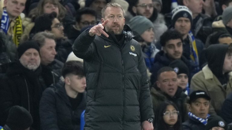 Chelsea's head coach Graham Potter gestures during the Champions League round of 16 second leg soccer match between Chelsea FC and Borussia Dortmund at Stamford Bridge, London, Tuesday March 7, 2023. (Alastair Grant/AP)
