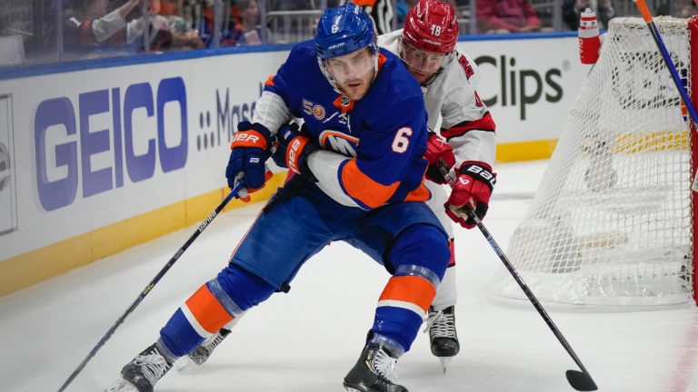 Carolina Hurricanes centre Jack Drury (18) skates against New York Islanders defenceman Ryan Pulock (6) during the first period of Game 3 in an NHL hockey Stanley Cup first-round playoff series Friday, April 21, 2023, in Elmont, N.Y. (Bryan Woolston/AP)