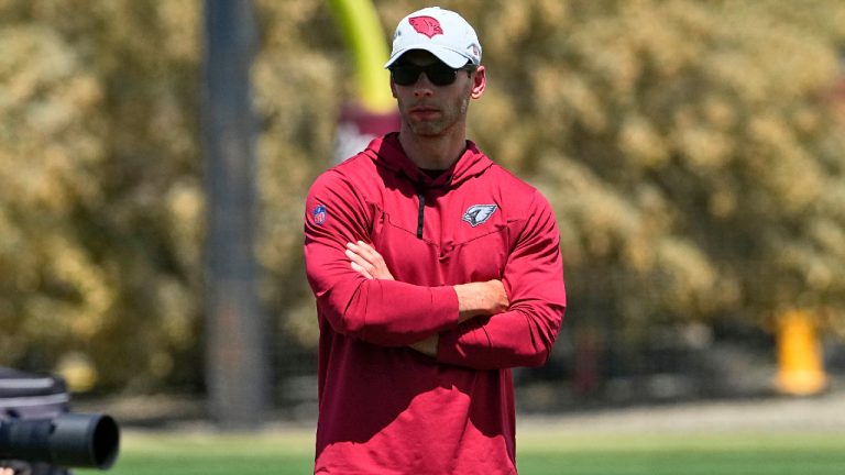 Arizona Cardinals head coach Jonathan Gannon watches his team during an organized team activity at the football club's raining facility, Wednesday, April 26, 2023, in Tempe, Ariz. (Matt York/AP)