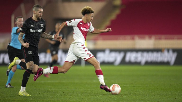 Monaco's Eliesse Ben Seghir, right, controls the ball by Leverkusen's Robert Andrich during the Europa League playoff second leg soccer match between AS Monaco and Bayer Leverkusen at the Stade Louis II in Monaco, Thursday, Feb. 23, 2023. (Daniel Cole/AP)