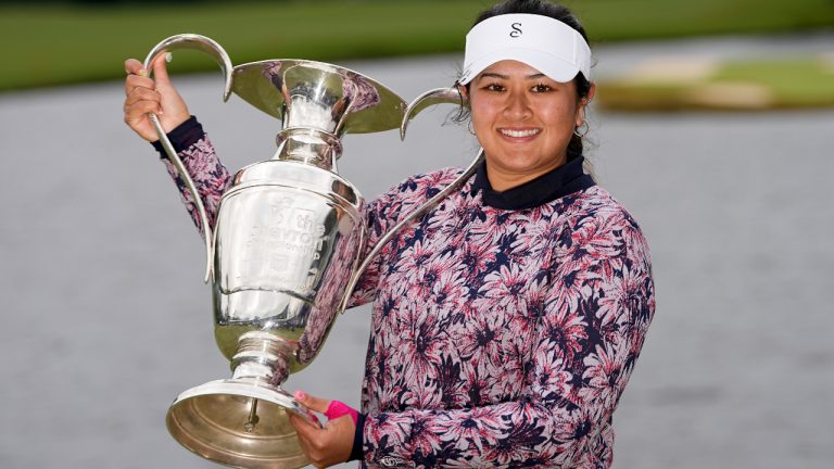 Lilia Vu holds the trophy after her playoff win against Angel Yin in the Chevron Championship women's golf tournament at The Club at Carlton Woods on Sunday, April 23, 2023, in The Woodlands, Texas. (David J. Phillip/AP)