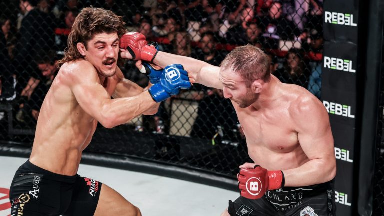 Canadian middleweight Aaron Jeffery (left) absorbs a blow from American John Salter at Bellator 293 on March 31, 2023. THE CANADIAN PRESS/HO-BELLATOR MMA/LUCAS NOONAN