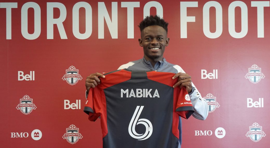 Newly acquired Toronto FC centre back Aime Mabika hard to miss at six foot six