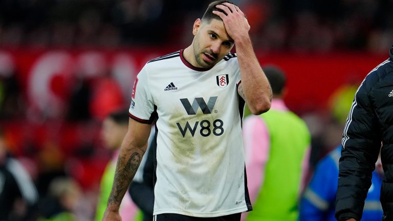 Fulham's Aleksandar Mitrovic reacts after he was shown a red card during the English FA Cup quarterfinal soccer match between Manchester United and Fulham at the Old Trafford stadium in Manchester, England, Sunday, March 19, 2023. (Jon Super/AP)