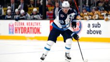 Jets sign Mark Scheifele, Connor Hellebuyck to identical extensions