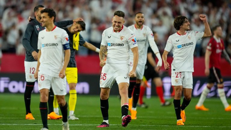 Sevilla players celebrate at the end of the Europa League quarter finals second leg soccer match between Sevilla and Manchester United, at the Ramon Sanchez Pizjuan stadium in Seville, Spain, Thursday, April 20, 2023. (Jose Breton/AP)