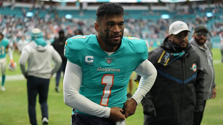 Miami Dolphins quarterback Tua Tagovailoa walks off the field after an NFL football game against the Green Bay Packers, Sunday, Dec. 25, 2022, in Miami Gardens, Fla. Tagovailoa has officially been ruled out for Sunday's game at New England after suffering a concussion in Miami's Christmas Day loss to Green Bay.
(Jim Rassol/AP)