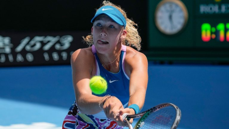 Mirra Andreeva of Russia plays a backhand return to compatriot Alina Korneeva in the girls singles final at the Australian Open tennis championship in Melbourne, Australia, Saturday, Jan. 28, 2023. (Aaron Favila/AP)