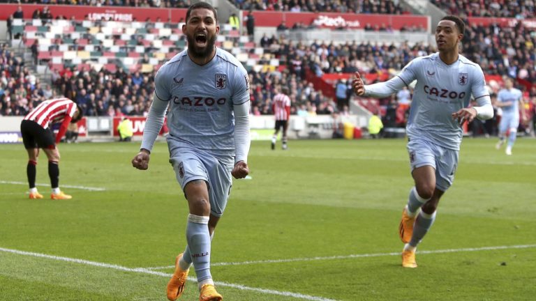 Aston Villa's Douglas Luiz celebrates scoring his side first goal to level the score at 1-1, during the English Premier League soccer match between Brentford and Aston Villa at the Gtech Community Stadium, in London, Saturday April 22, 2023. (Kieran Cleeves/PA via AP)