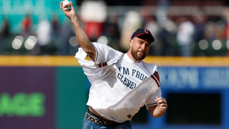 Kansas City Chiefs tight end Travis Kelce throws out the ceremonial first pitch before a baseball game between the Cleveland Guardians and the Seattle Mariners, Friday, April 7, 2023, in Cleveland. (Ron Schwane/AP)