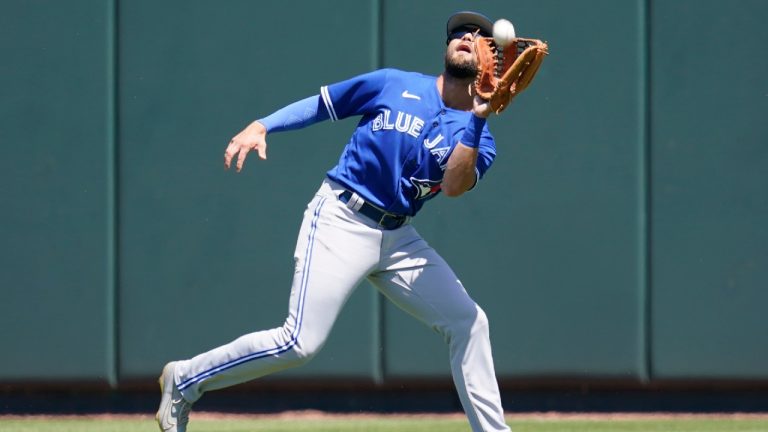 Toronto blue Jays centre fielder Nathan Lukes catches a fly ball for an out during a spring training baseball game against the Atlanta Braves at CoolToday Park Monday March 28, 2022, in North Port, Fla. (Steve Helber/AP)