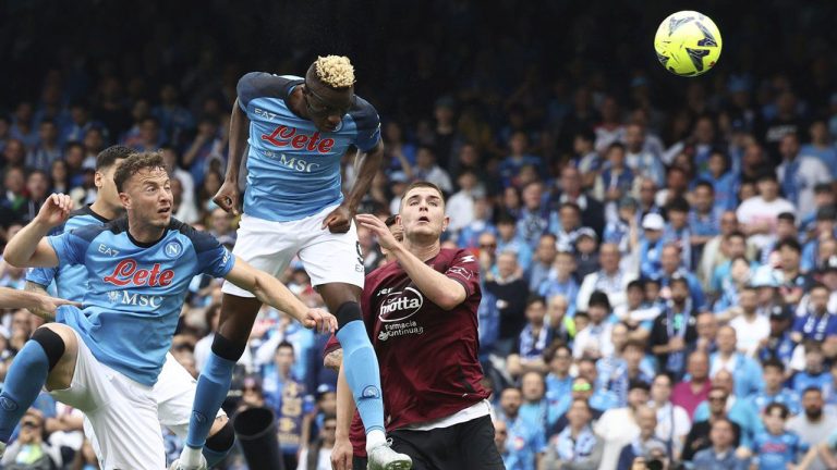 Napoli's Victor Osimhen, top center, heads the ball during the Serie A soccer match between Napoli and Salernitana. (Alessandro Garofalo/AP)
