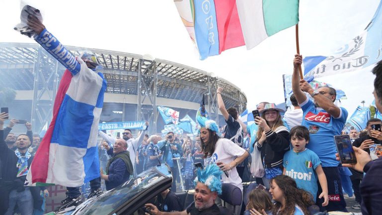 Napoli fans celebrate outside the Diego Maradona stadium in Naples. (Gregorio Borgia/AP)