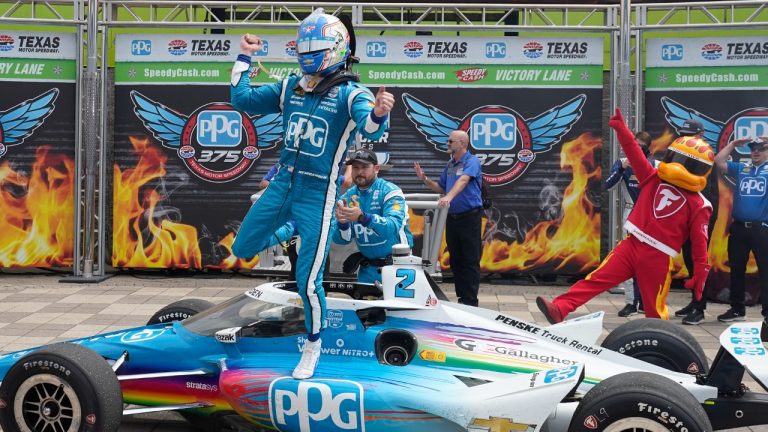 Josef Newgarden (2) celebrates after winning the IndyCar auto race at Texas Motor Speedway in Fort Worth, Texas, Sunday, April 2, 2023. (LM Otero/AP)
