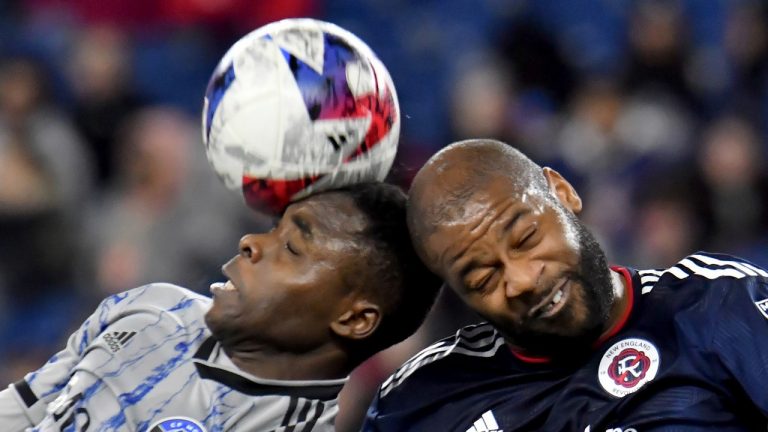 CF Montral forward Sunusi Ibrahim, left, and New England Revolution defender Andrew Farrell head the ball in the second half of an MLS soccer match Saturday, April 8, 2023, in Foxborough, Mass. (Mark Stockwell/AP Photo)