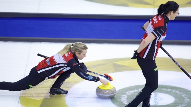 Silvana Tirinzoni (left) prepares to shoot a stone as Carole Howald (right) gets ready to sweep during Draw 15 of the Princess Auto Players' Championship on Friday, April 14, 2023, in Toronto. (Anil Mungal/GSOC)