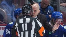 Controversial penalty call by linesman looms large in Canucks’ loss to Flames