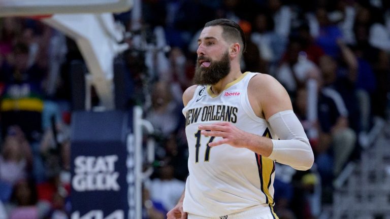 New Orleans Pelicans center Jonas Valanciunas (17) sticks out his tongue and signals a 3-point basket in the second half of an NBA basketball game against the Los Angeles Clippers in New Orleans, Saturday, April 1, 2023. (Matthew Hinton/AP Photo)