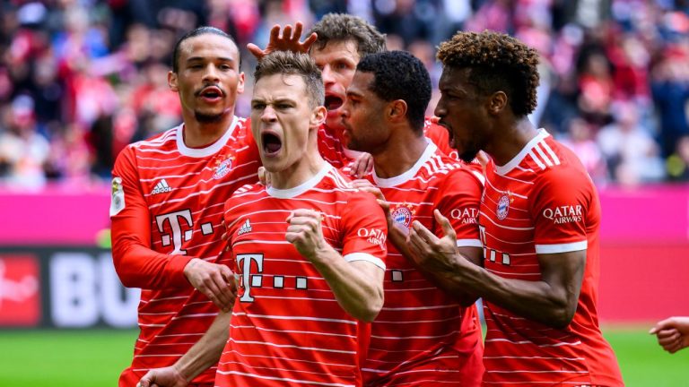 Munich's scorer Joshua Kimmich celebrates with his teammates after scoring his side's second goal during the German Bundesliga soccer match between FC Bayern Munich and FC Schalke 04 in Munich, Germany, Saturday, May 13, 2023. (Tom Weller/AP PHoto)