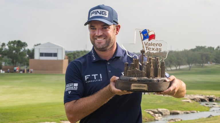 Corey Conner holds the Valero Texas Open trophy after winning the golf tournament in San Antonio, Sunday, April 2, 2023. (Michael Thomas/AP)