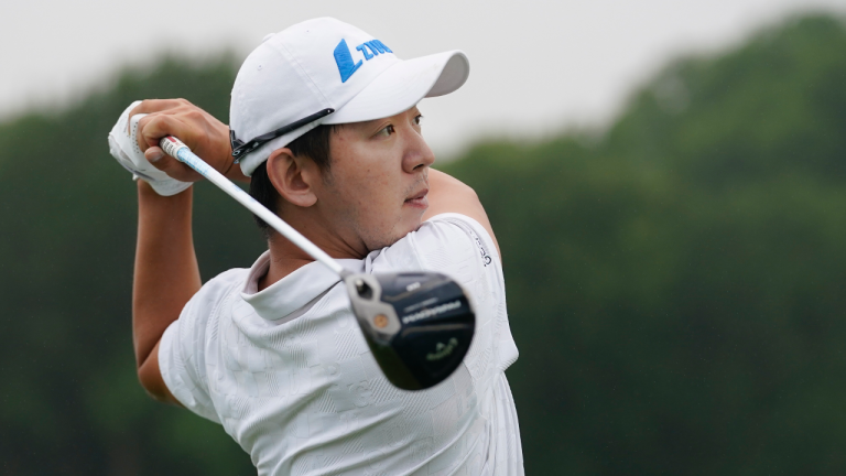 S.Y. Noh, of South Korea, watches a tee shot on the 10th hole during the first round of the Byron Nelson golf tournament in McKinney, Texas, Thursday, May 11, 2023. (AP Photo/LM Otero)