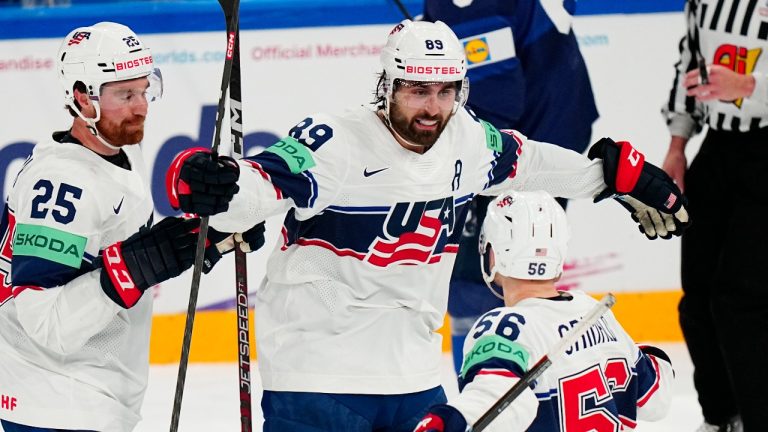 United States Alex Tuch, centre, celebrates with teammates after scoring his side's fourth goal during the group A match between Finland and USA at the ice hockey world championship in Tampere, Finland, Friday, May 12, 2023. (Pavel Golovkin/AP)