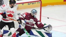 Flames’ Weegar, Canadiens’ Montembeault lead Canada to win over Latvia at worlds