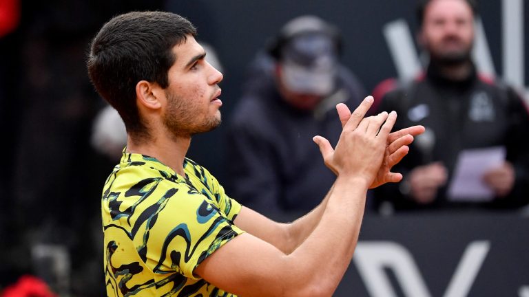 Carlos Alcaraz of Spain applauds the crowd after winning his match against Albert Ramos-Vinolas of Spain at the Italian Open tennis tournament, in Rome, Saturday, May 13, 2023. (Antonietta Baldassarre/AP)