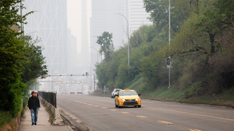 Thick smoke from wildfires blankets the downtown for a second day in Calgary, Alta., Wednesday, May 17, 2023. The Alberta government says hot and dry conditions are expected to continue in the coming days, providing no relief for the roughly 2,500 people fighting wildfires in the province. THE CANADIAN PRESS/Jeff McIntosh