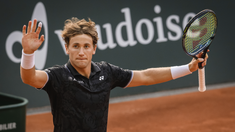 Casper Ruud of Norway celebrates after beating J.J. Wolf of the United States after their second round match, at the Geneva Open tennis tournament in Geneva, Switzerland, Wednesday, May 24, 2023. (Jean-Christophe Bott/Keystone via AP)