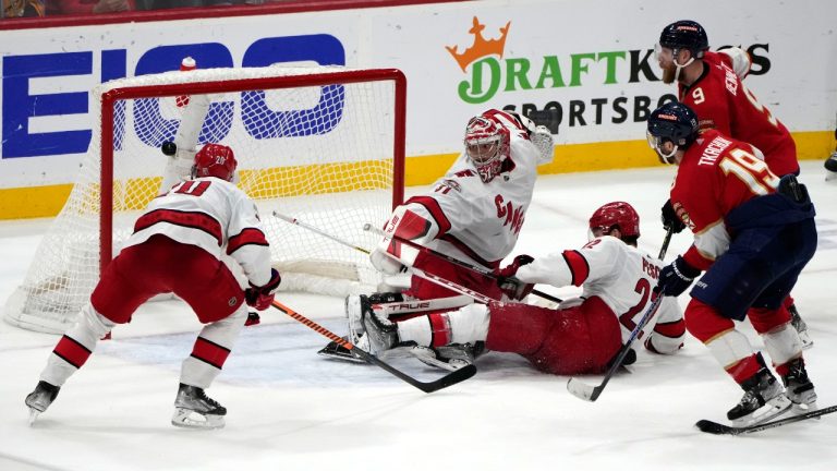 Florida Panthers left wing Matthew Tkachuk (19) scores the game-winning goal against Carolina Hurricanes goaltender Frederik Andersen (31) during the third period of Game 4 of the NHL hockey Stanley Cup Eastern Conference finals, Wednesday, May 24, 2023, in Sunrise, Fla. (Lynne Sladky/AP)