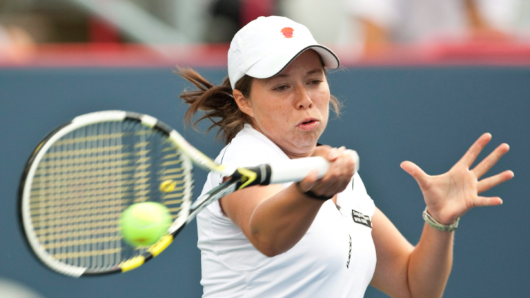Valérie Tétreault from St-Jean-sur-Richelieu, Que. returns to Marion Bartoli from France during first round play at the Rogers Cup tennis tournament Tuesday, August 17, 2010 in Montreal. THE CANADIAN PRESS/Paul Chiasson