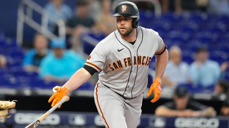 Darin Ruf tosses his bat as he draws a walk during the first inning of a baseball game against the Miami Marlins, Wednesday, April 19, 2023, in Miami. (Lynne Sladky/AP)