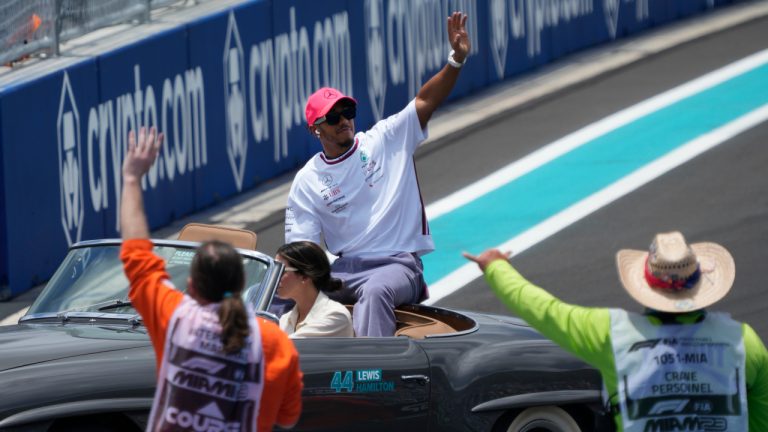 Mercedes driver Lewis Hamilton of Britain waves to the crowd during the drivers parade before during the Formula One Miami Grand Prix auto race at the Miami International Autodrome, Sunday, May 7, 2023, in Miami Gardens, Fla. (Wilfredo Lee/AP)