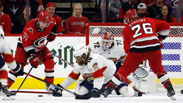 Carolina Hurricanes' Jesper Fast (71) tries to shoot the puck in front of Florida Panthers goaltender Sergei Bobrovsky (72) and Marc Staal (18) with Hurricanes' Paul Stastny (26) nearby during the third period of Game 2 of the NHL hockey Stanley Cup Eastern Conference finals in Raleigh, N.C., Saturday, May 20, 2023. (Karl B DeBlaker/AP)