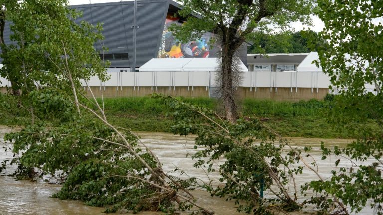 A view of the swollen Santerno River with behind the Enzo e Dino Ferrari circuit, in Imola, Italy, Wednesday, May 17, 2023. The weekend's Emilia-Romagna Grand Prix in Imola has been canceled because of deadly floods. Formula One said it made the decision for safety reasons and to avoid any extra burden on the emergency services. F1 personnel had earlier been told to stay away from the track after floods affected large parts of the Emilia-Romagna region. (Luca Bruno/AP)
