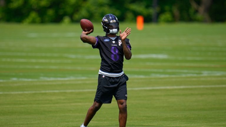 Baltimore Ravens quarterback Lamar Jackson works out during the team's NFL football practice, Wednesday, May 24, 2023, in Owings Mills. (Julio Cortez/AP)