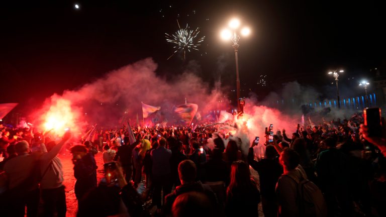 Napoli fans celebrates after winning the Italian league soccer title, in Naples, Italy, Thursday, May 4, 2023. (Andrew Medichini/AP)