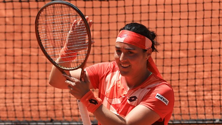 Tunisia's Ons Jabeur celebrates winning her first round match of the French Open tennis tournament against Italy's Lucia Bronzetti in two sets, 6-4, 6-1, at the Roland Garros stadium in Paris, Tuesday, May 30, 2023. (Aurelien Morissard/AP)