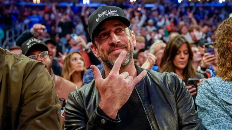 New York Jets quarterback Aaron Rodgers attends the first half of Game 1 in the NBA basketball Eastern Conference semifinals playoff series between the New York Knicks and the Miami Heat. (John Minchillo/AP)