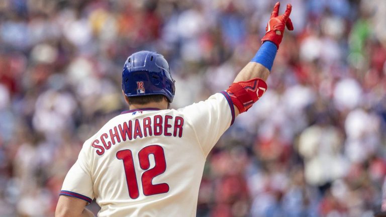 Philadelphia Phillies designated hitter Kyle Schwarber gestures after hitting a home run during the seventh inning of a baseball game against the Boston Red Sox, Sunday, May 7, 2023, in Philadelphia. (Laurence Kesterson/AP)