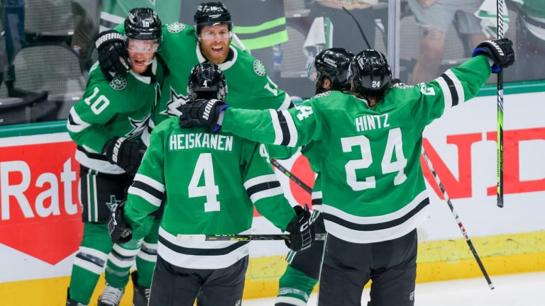 Dallas Stars, including Ty Dellandrea (10), Miro Heiskanen (4) and Roope Hintz (24) celebrate with Joe Pavelski (16) after his overtime goal against the Vegas Golden Knights in Game 4 of the NHL hockey Stanley Cup Western Conference finals Thursday, May 25, 2023, in Dallas. (Gareth Patterson/AP)