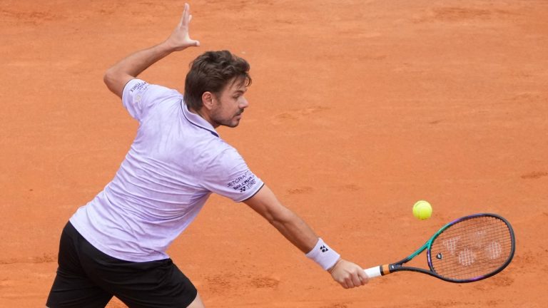 Switzerland's Stan Wawrinka returns the ball to Belarus' Ilya Ivashka during their match at the Italian Open tennis tournament. (Gregorio Borgia/AP)
