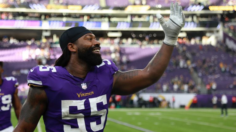 Minnesota Vikings linebacker Za'Darius Smith (55) waves to fans as he leaves the field after an NFL football game against the Green Bay Packers, Sunday, Sept. 11, 2022, in Minneapolis. The Vikings won 23-7. (Abbie Parr/AP)