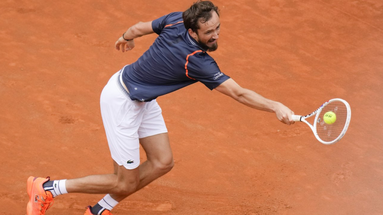 Russia's Daniil Medvedev returns the ball to Germany's Yannick Hanfmann during their quarter final match at the Italian Open tennis tournament, in Rome, Thursday, May 18, 2023. (AP Photo/Alessandra Tarantino)
Alessandra Tarantino
