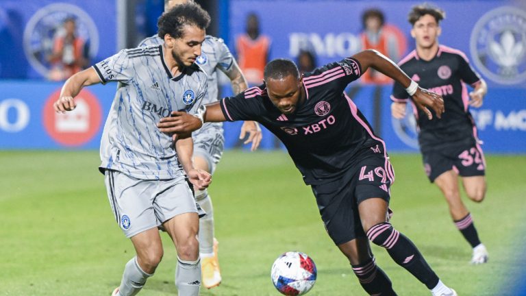 CF Montreal's Ahmed Hamdi, left, challenges Inter Miami's Shanyder Borgelin (49) during second half MLS soccer action in Montreal, Saturday, May 27, 2023. (Graham Hughes/CP)