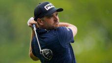 Conners puts on putting exhibition to grab piece of PGA Championship lead