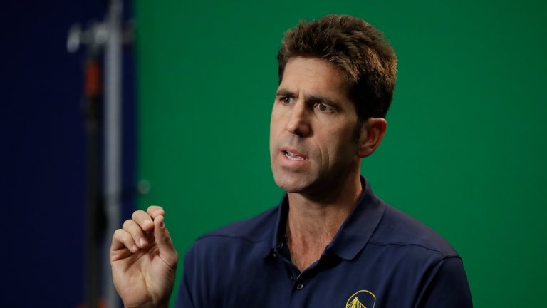 In this Sept. 30, 2019, file photo, Golden State Warriors general manager Bob Myers gestures during the NBA basketball team's media day in San Francisco. (AP Photo)