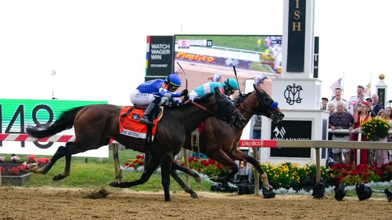 National Treasure, right, with jockey John Velazquez, edges out Blazing Sevens, with jockey Irad Ortiz Jr., to win the148th running of the Preakness Stakes horse race at Pimlico Race Course, Saturday, May 20, 2023, in Baltimore. (Julio Cortez/AP)